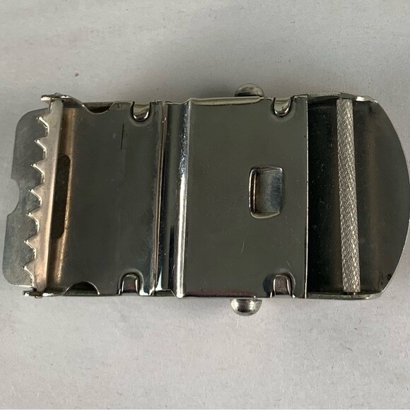 U.S. Navy belt buckle. “U.S.S. Algol AKA-54. Raised ship graphic.