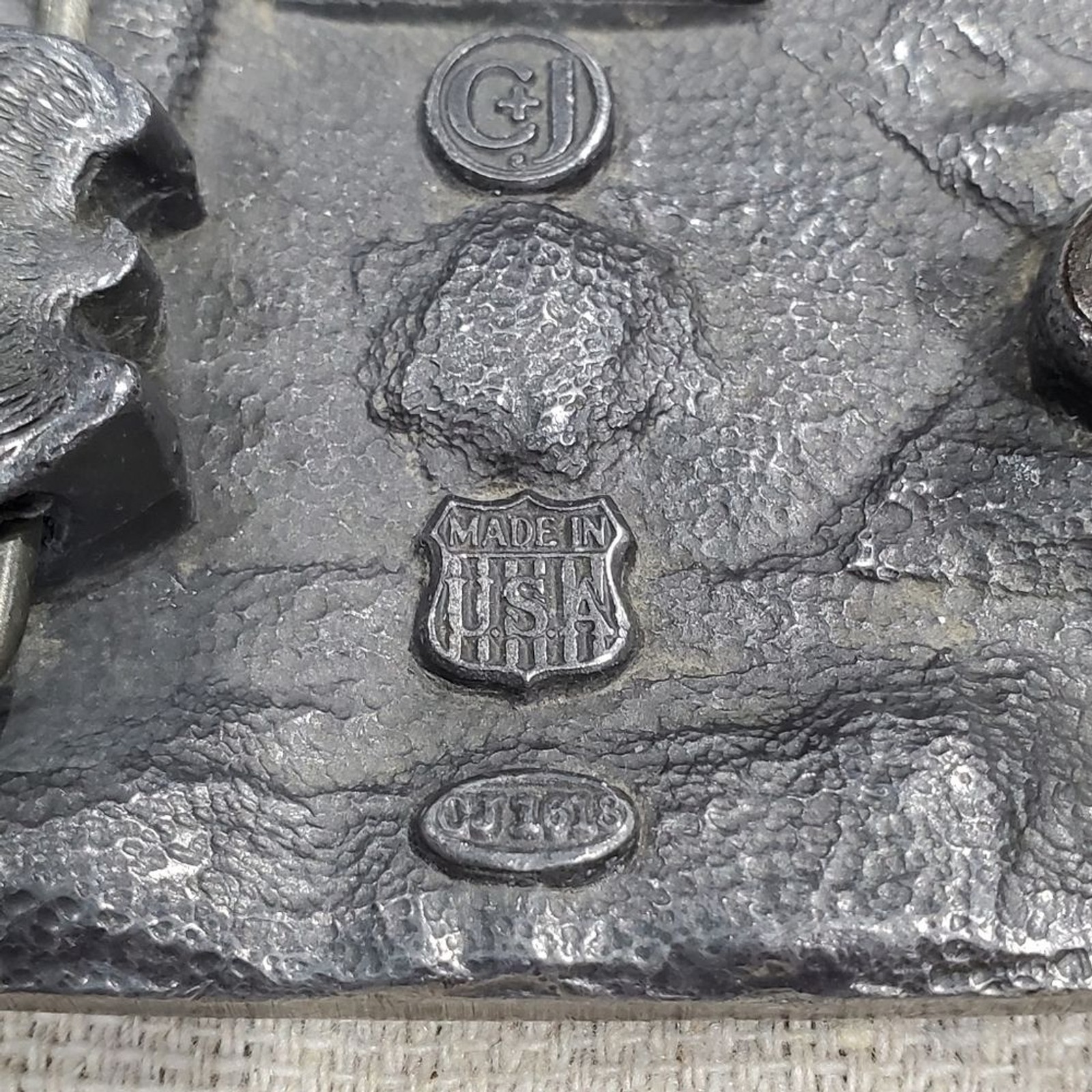 VINTAGE CARPENTER BELT BUCKLE SILVER METAL C&J INC 1994 COLLECTIBLE MENSWEAR DAD