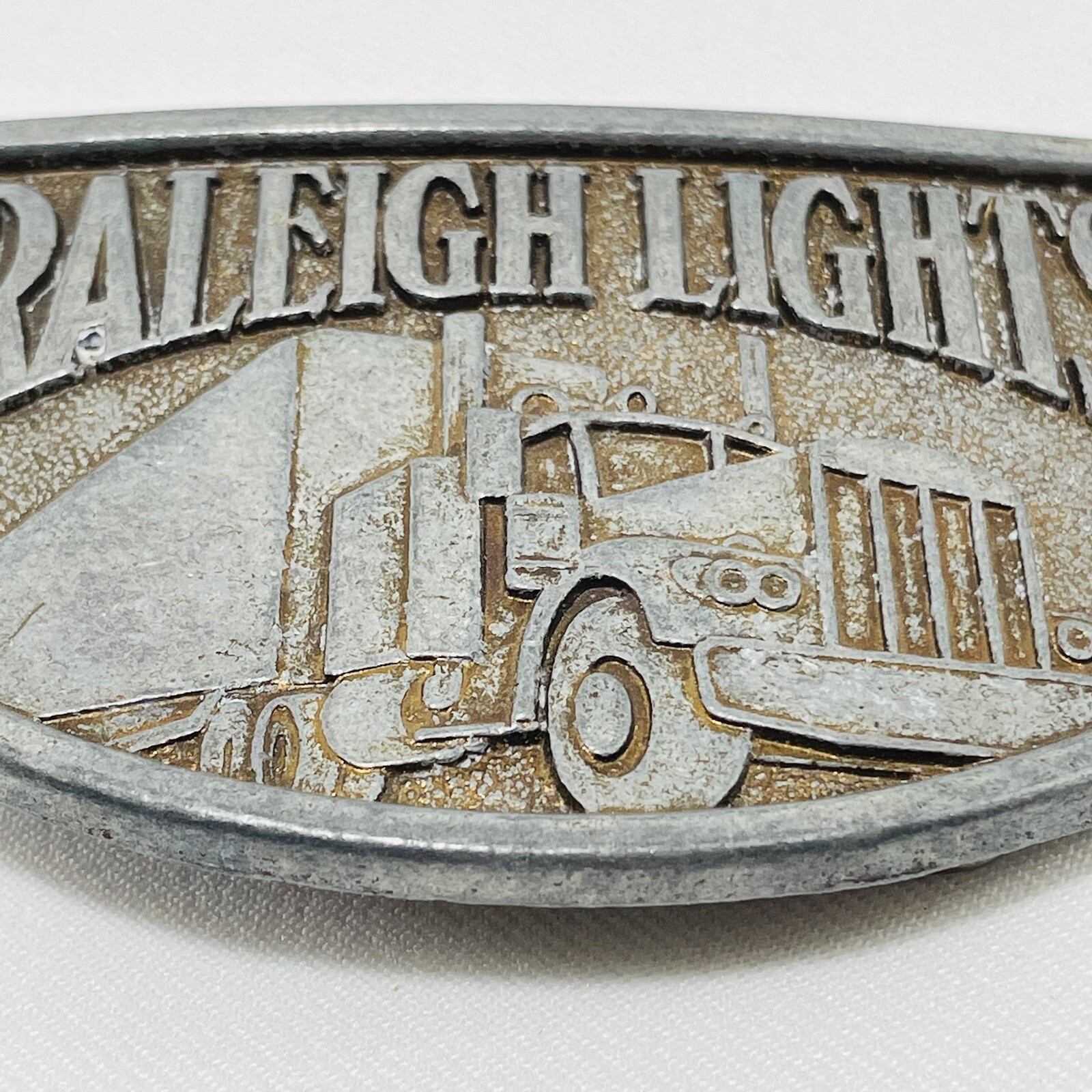 Vintage Raleigh Lights Belt Buckle Men Truck Semi Vehicle Transportation Silver