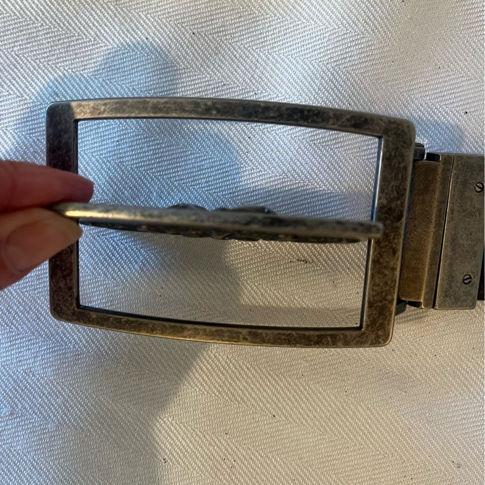 Fleur de Lis reversible pewter type belt buckle. Monogram M on the reverse side