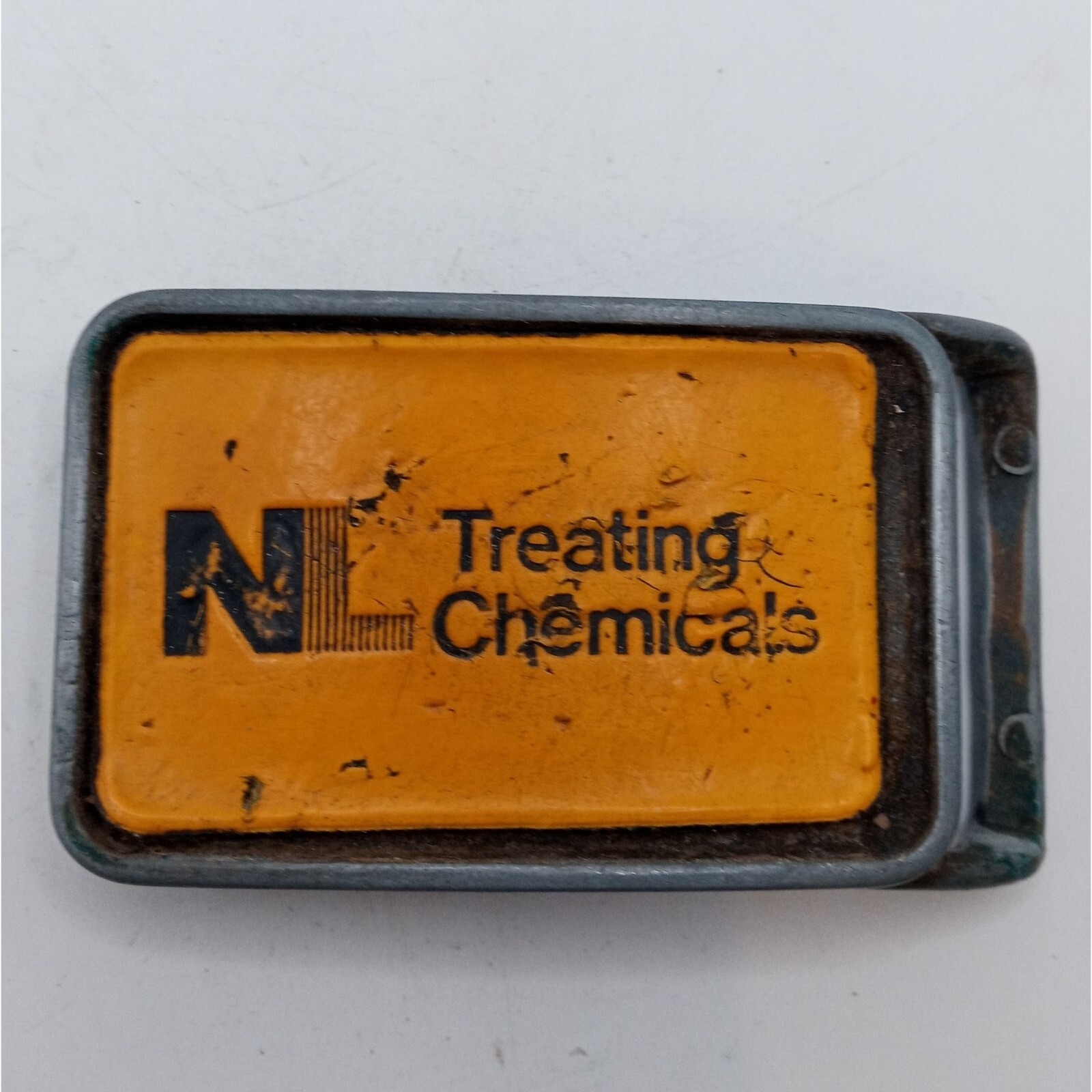 NL Treating Chemicals Belt Buckle Yellow Vintage Distressed Well Worn