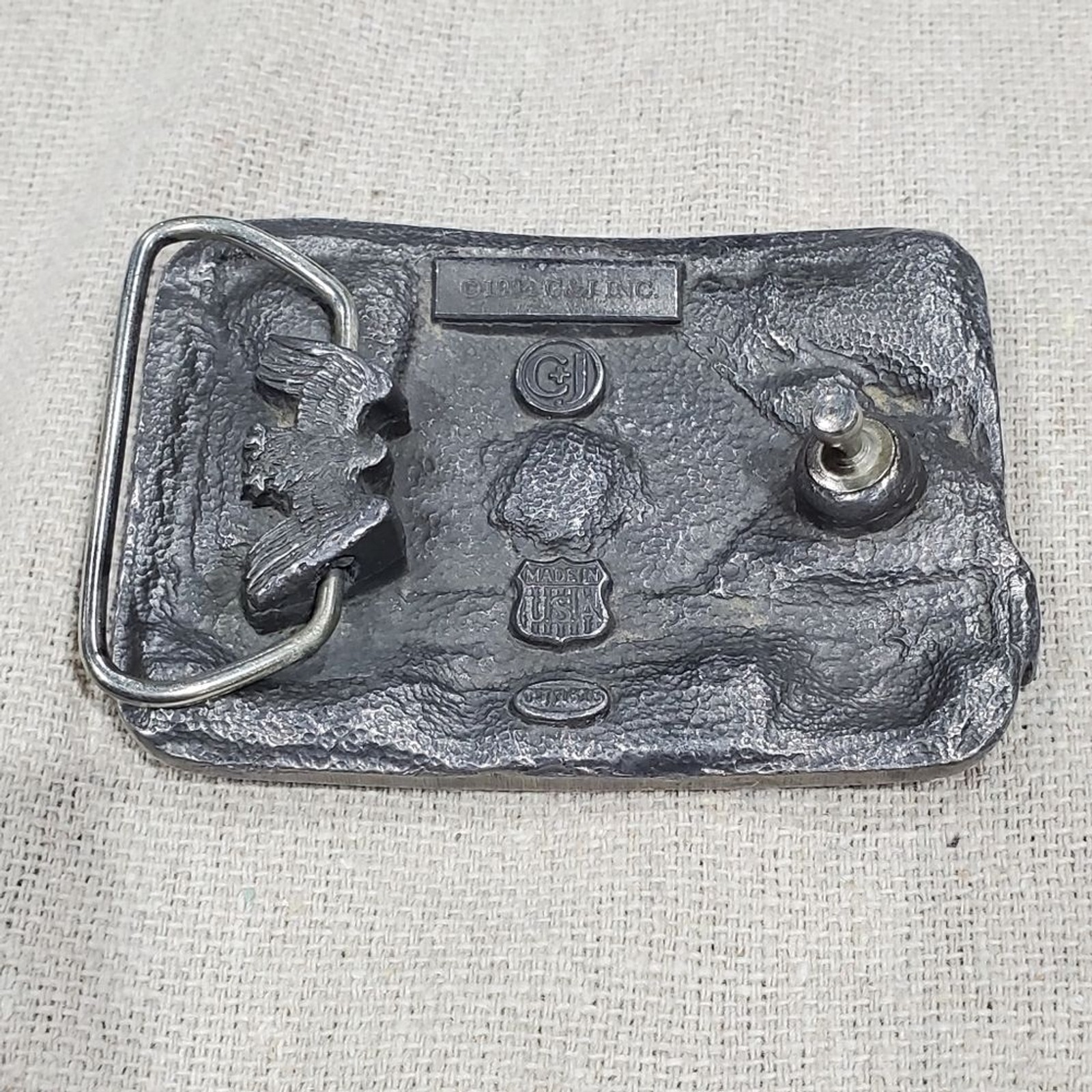 VINTAGE CARPENTER BELT BUCKLE SILVER METAL C&J INC 1994 COLLECTIBLE MENSWEAR DAD