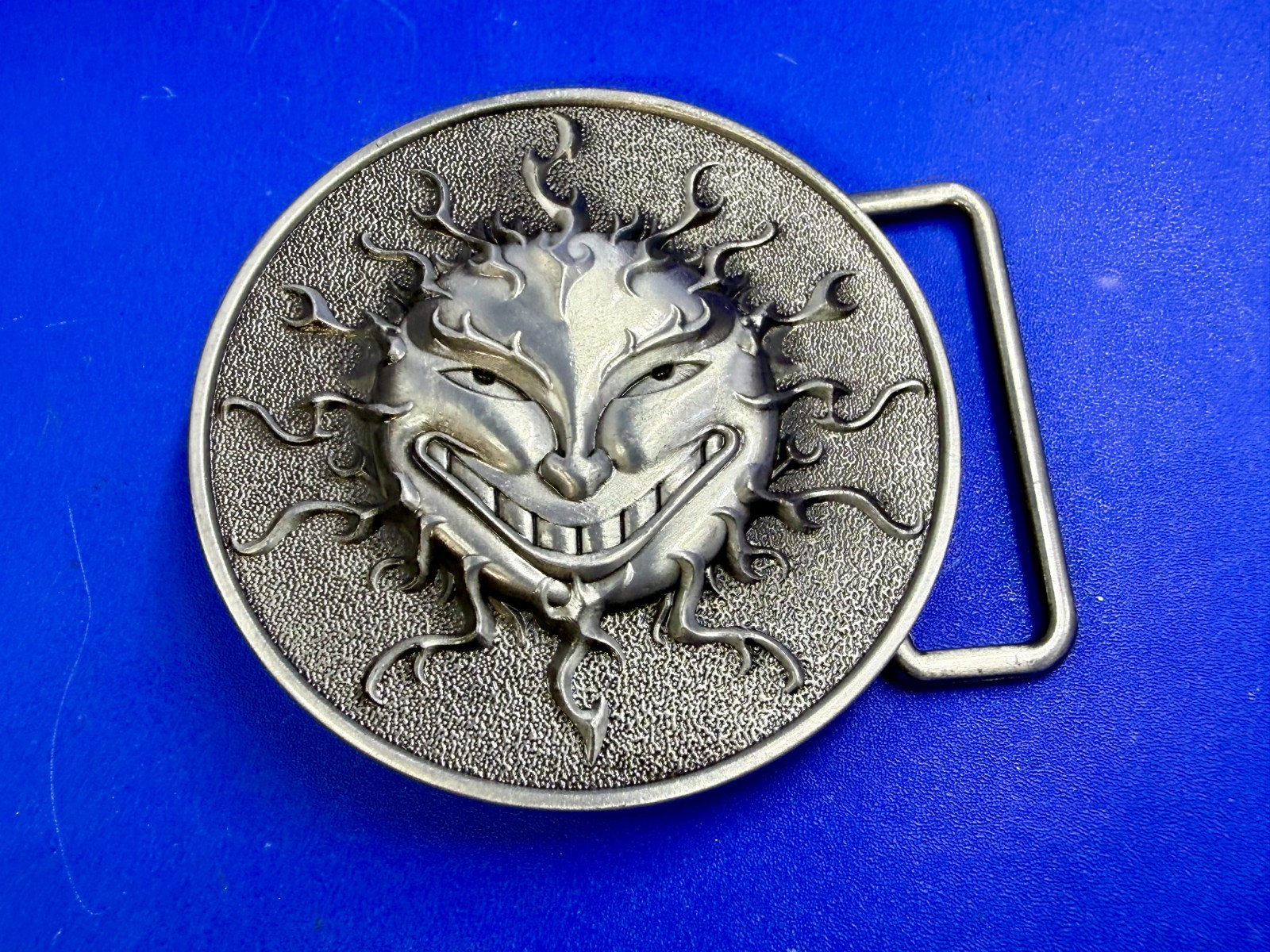 Flaming Sun Solar Flare Grinning Creepy Smile Novelty Belt Buckle by Buckle Rage