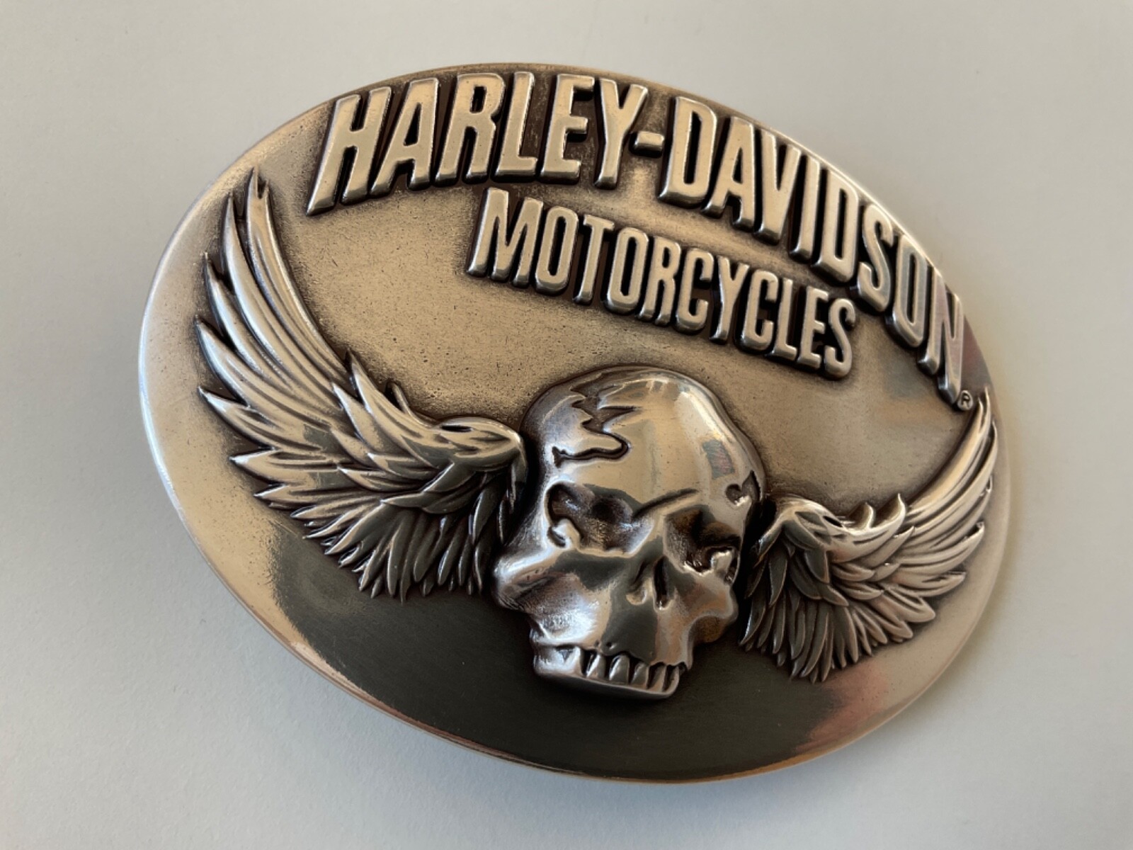 Harley-Davidson men&rsquo;s Skull with Wings belt buckle.#97744-08VM.Silver plated.