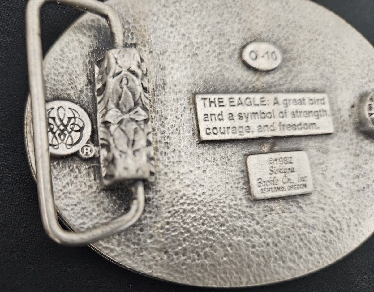 Siskiyou Buckle Company – Eagle Landing, Mountains, Sunset – No. 0-10 (1982)