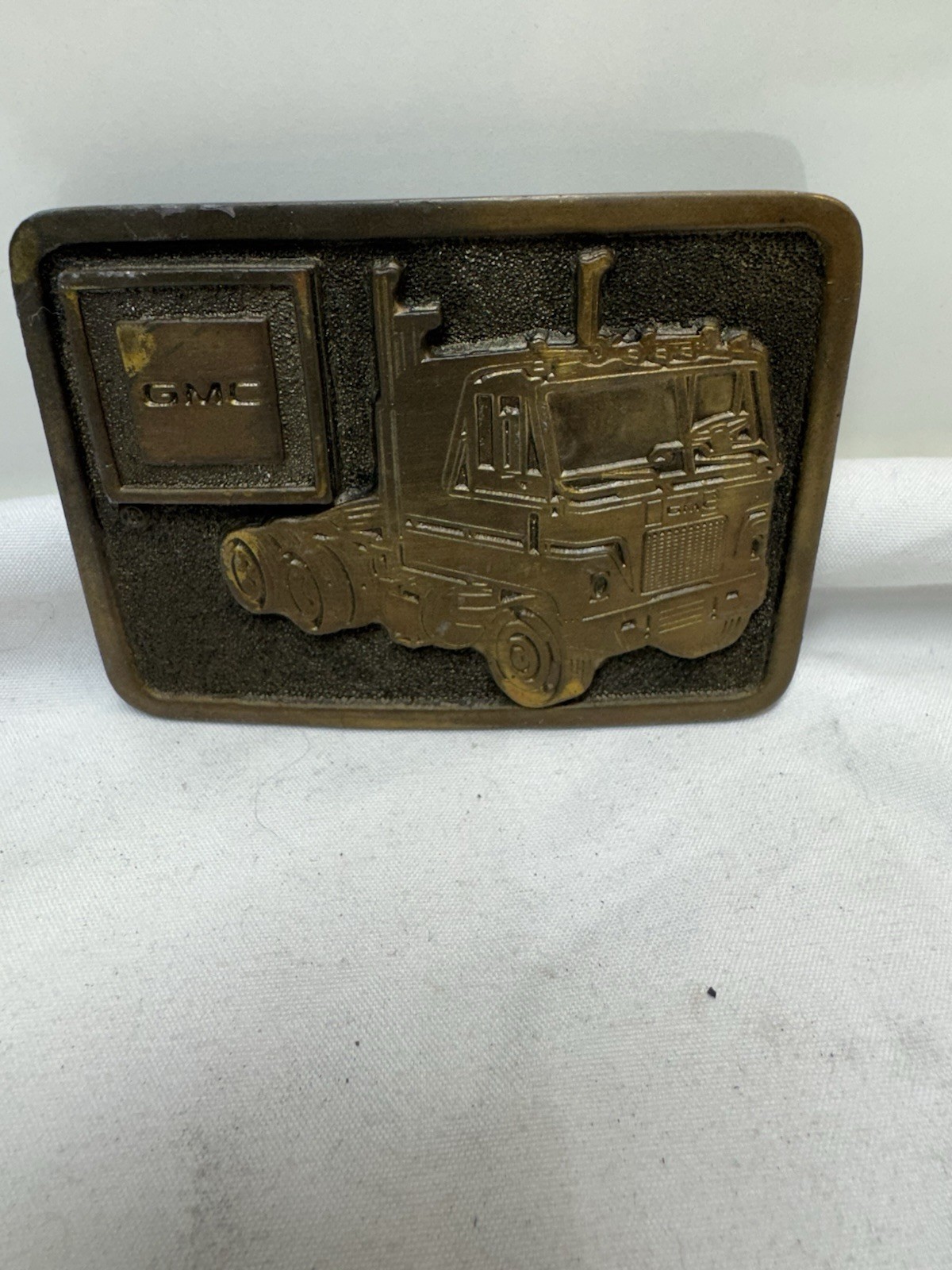 Vtg 1976 GMC Big Rig Scripted Trucking Adezy Belt Buckle USA