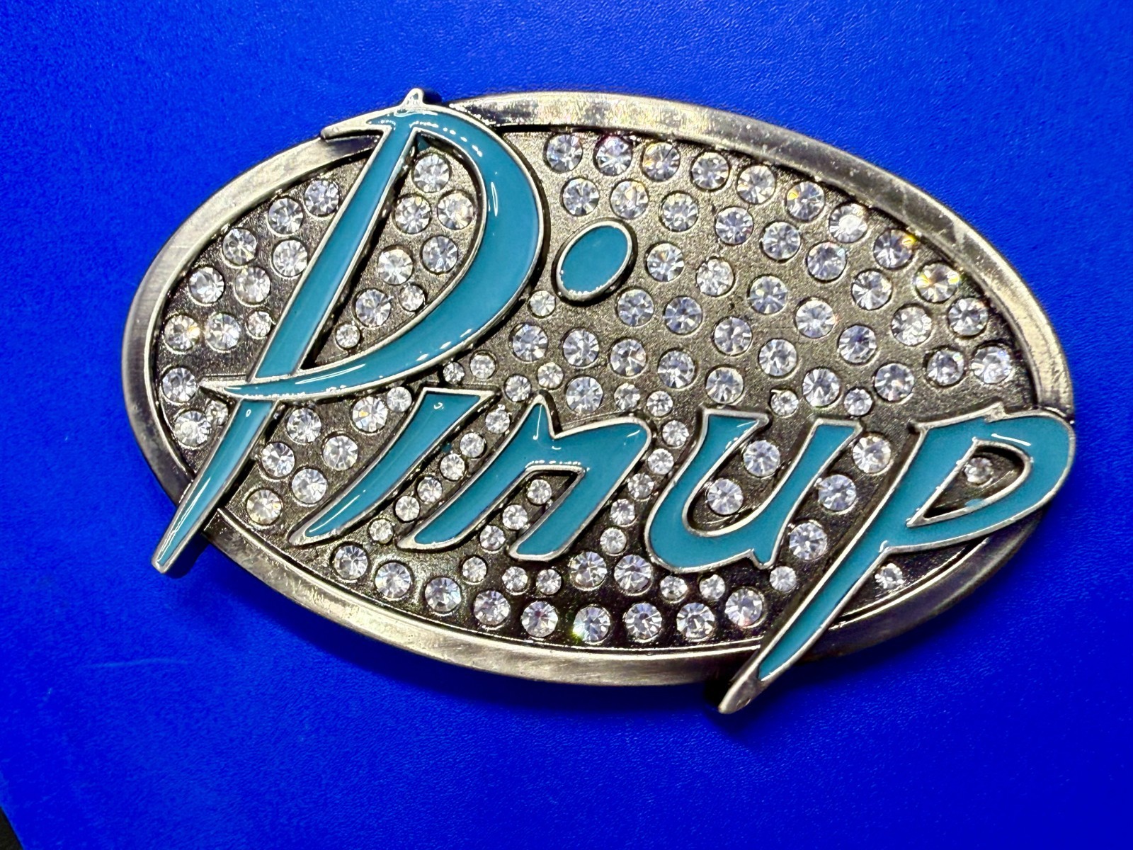 Pinup Girl – Blue Lettering Fashion Statement Novelty Jeweled Oval Belt Buckle