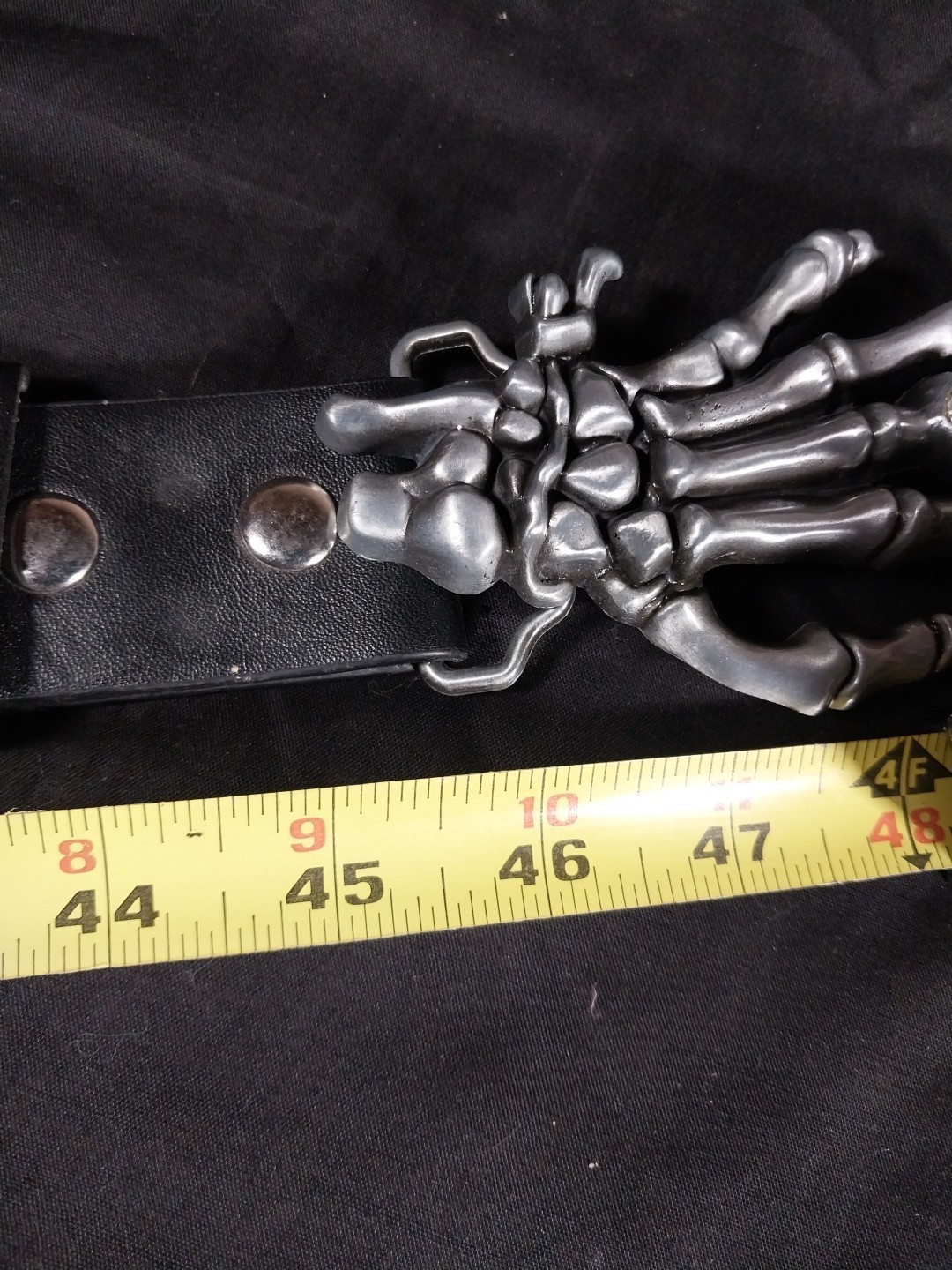 Studded Leather Belt With Skelton Hand Buckle 42&Prime;