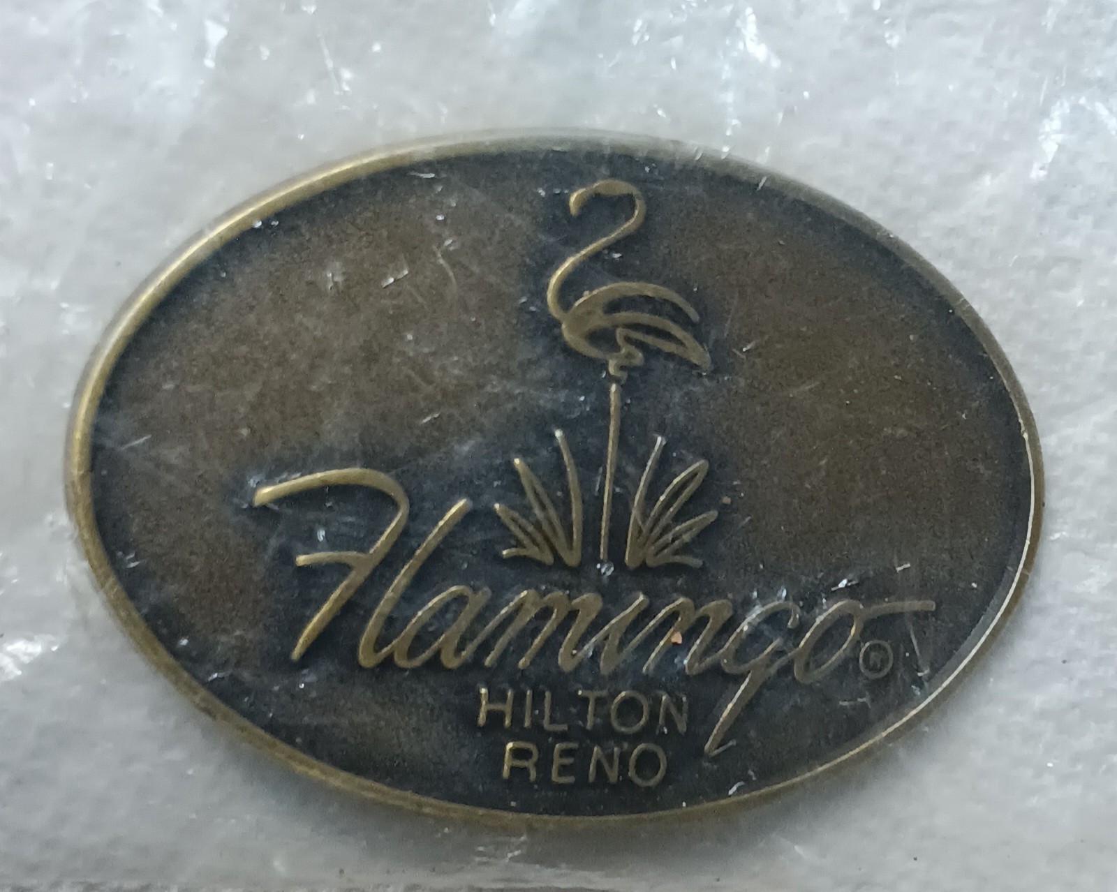 BELT BUCKLE from the FLAMINGO HILTON RENO in original plastic,/ FREE SHIPPING