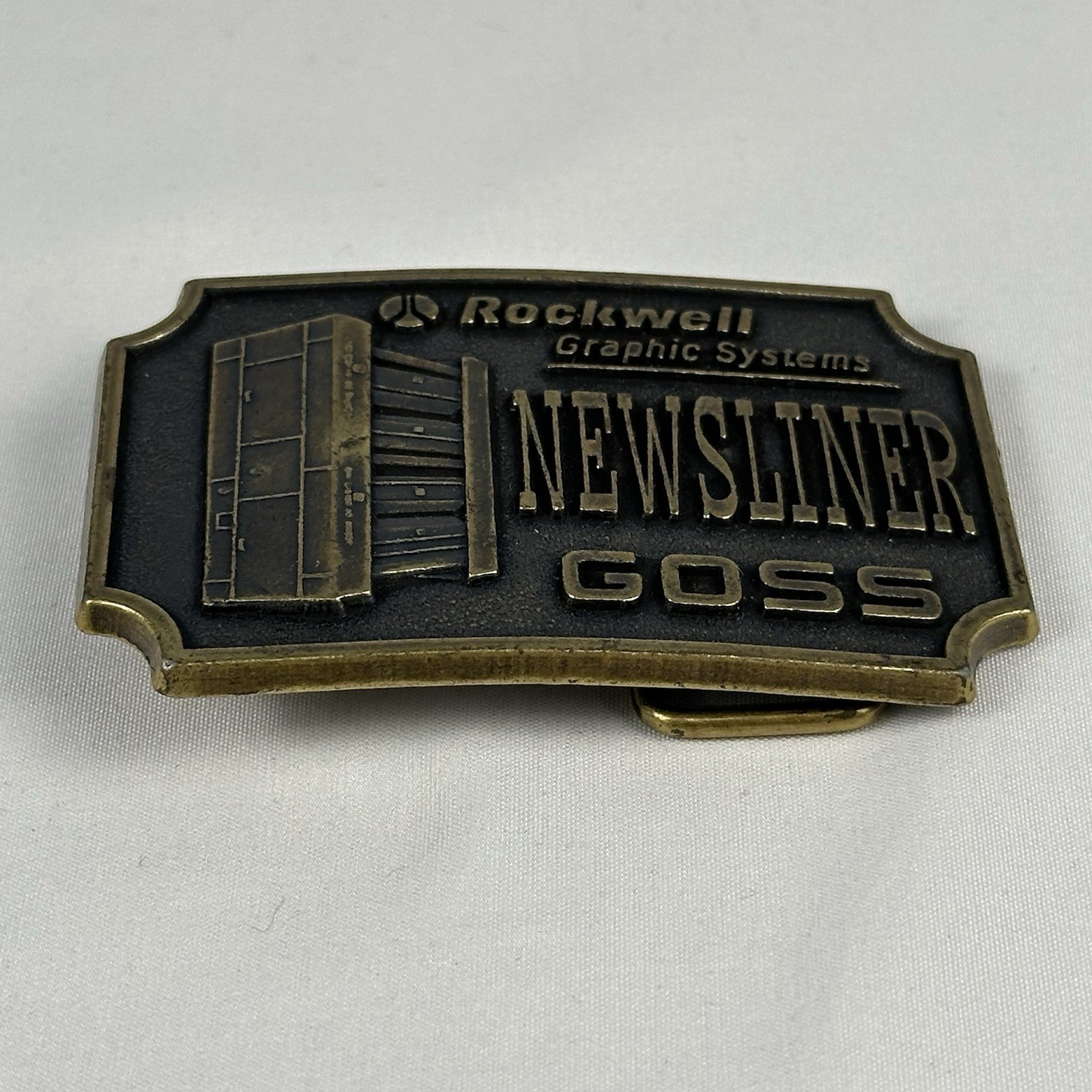 Vintage Rockwell Graphic Systems Newsliner Goss Belt Buckle Brass Industrial