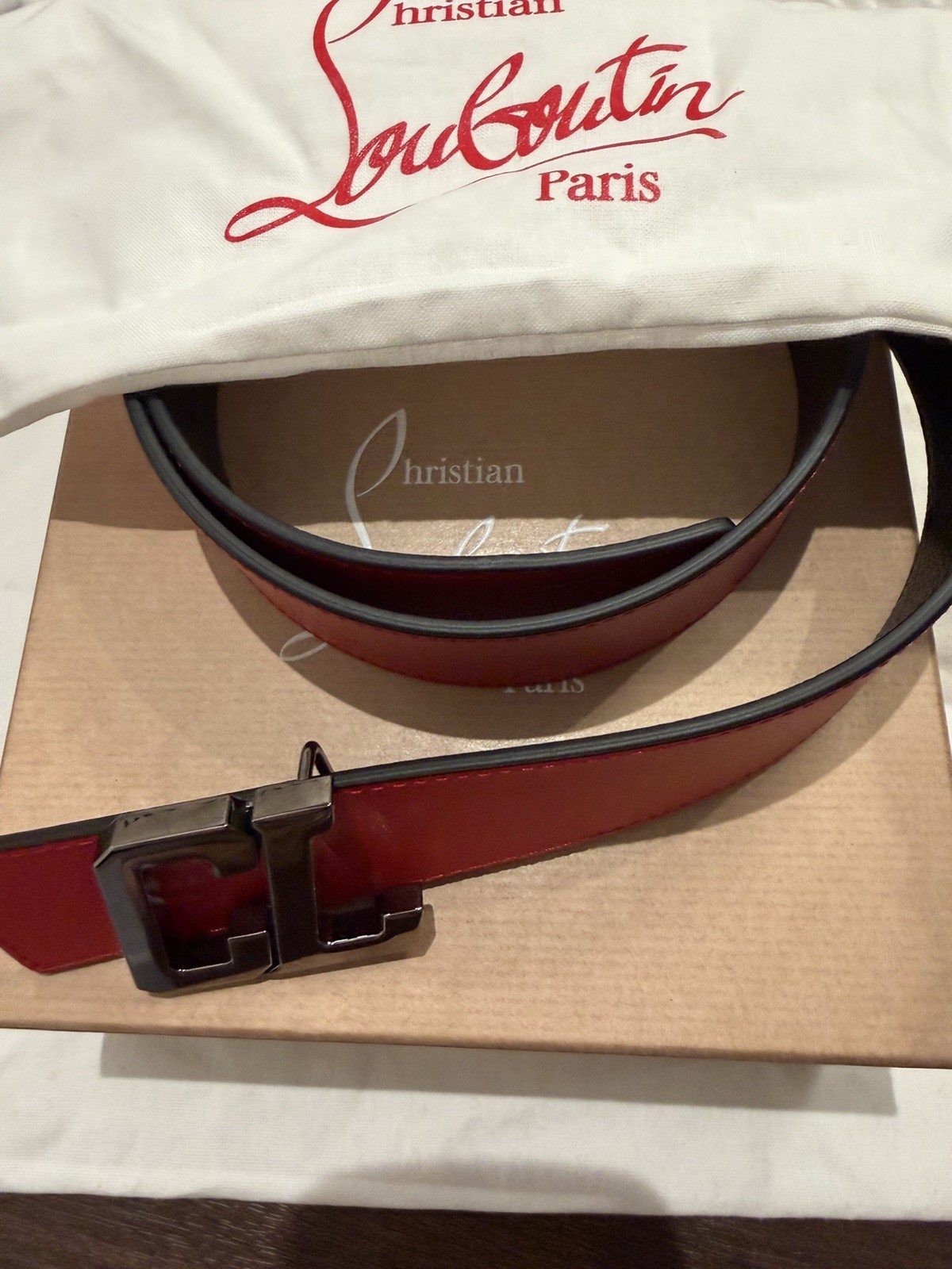 NEW CHRISTIAN LOUBOUTIN RED/ BLACK REVERSIBLE BELT. WITH BOX DUST BAG TAGS