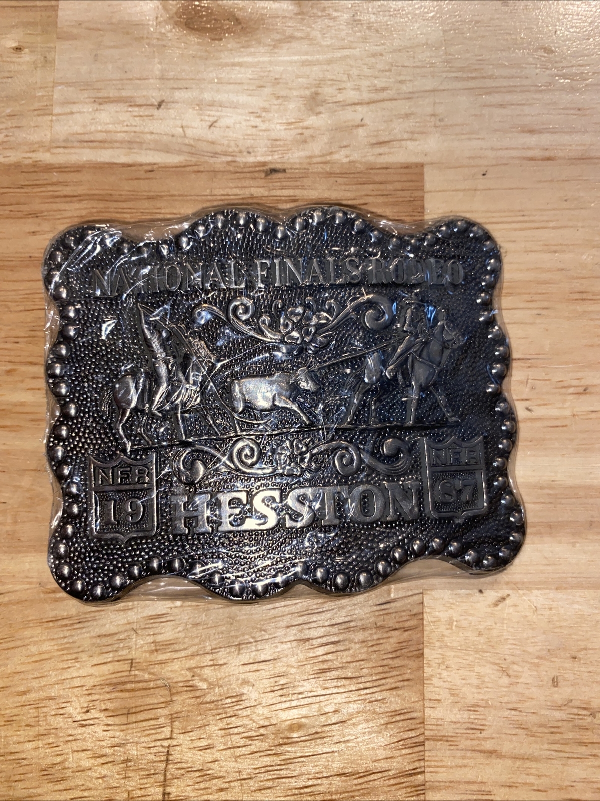Hesston Vintage Rodeo Belt Buckle 1987 METAL Original Wrap National Finals NFR