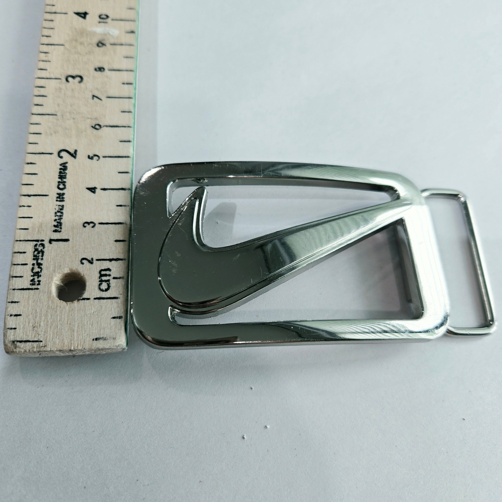 Nike Belt Buckle Silver Swoosh Logo Cutout Metal Streetwear Accessory #1154
