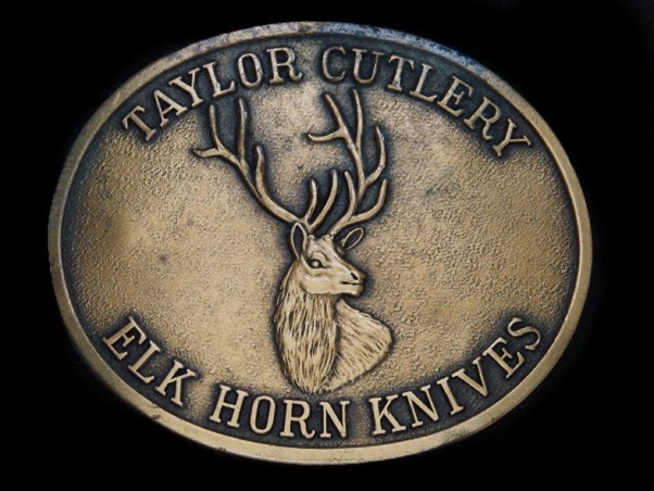 TG13123 VINTAGE 1970s **TAYLOR CUTLERY ELK HORN KNIVES** BELT BUCKLE