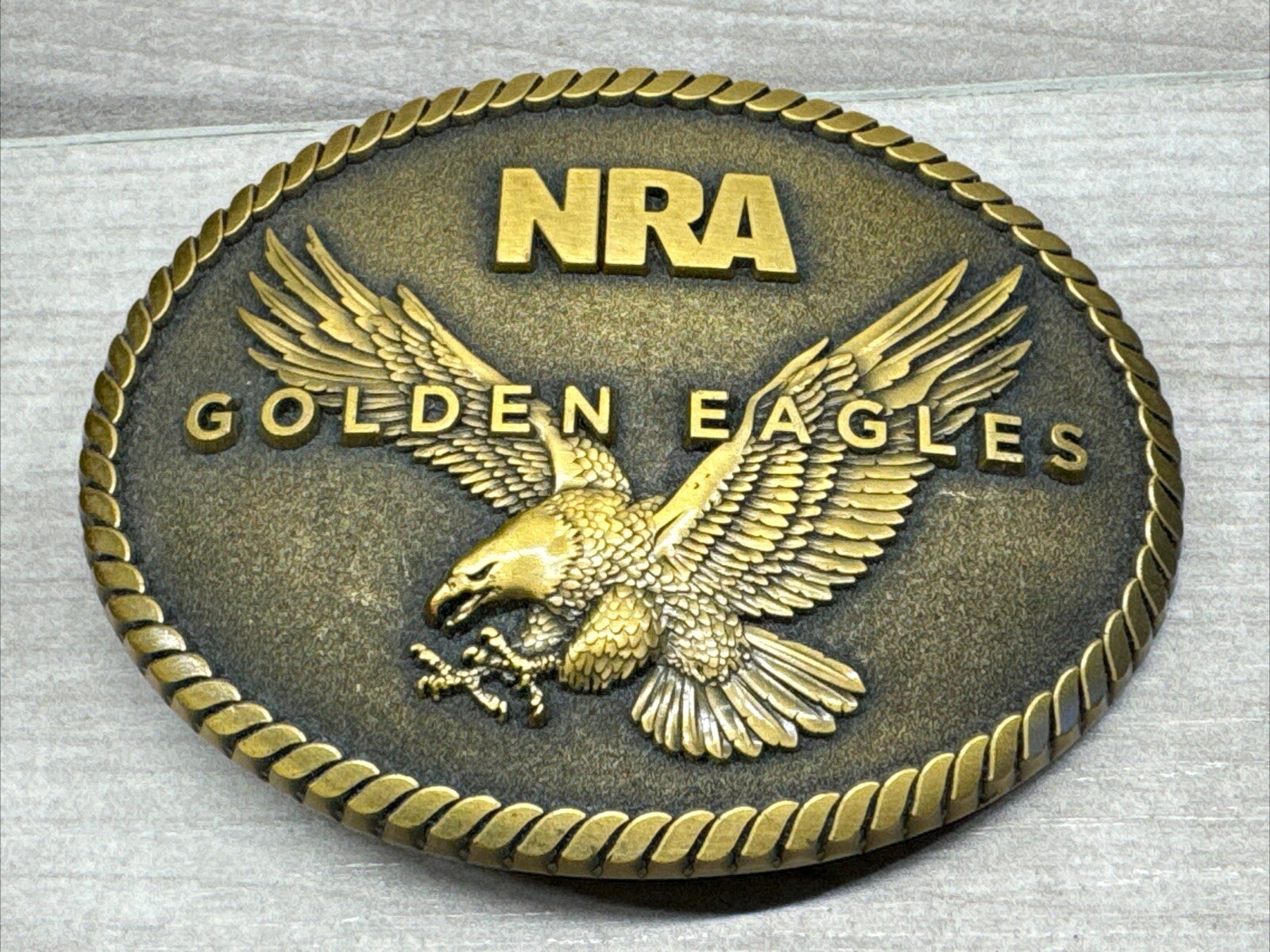 NRA Golden Eagles Belt Buckle National Rifle Association Bronze Color NEW IN BOX