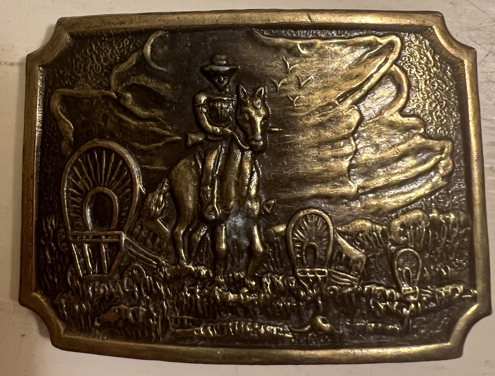 Belt Buckle With A Man And A Horse On It