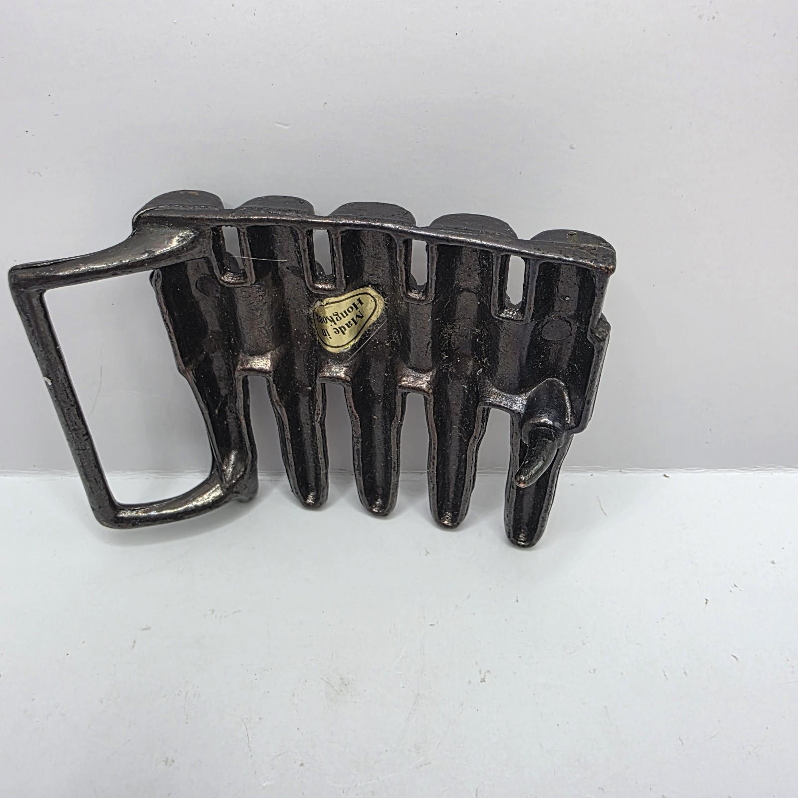 Vintage 1980&rsquo;s Metal bullet belt buckle copper tone gun ammunition. Hong Kong