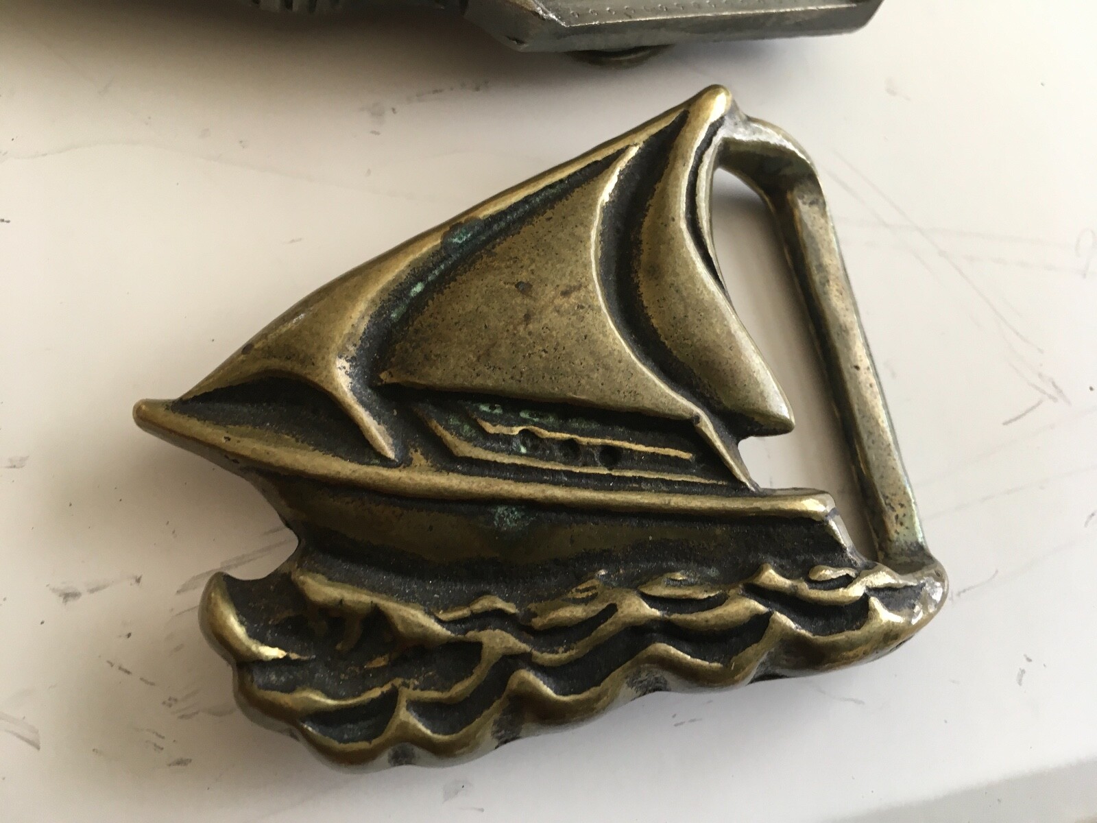 3 Vintage Belt Buckles – Snow Machine, Bull Dozer, Sail Boat – Unused
