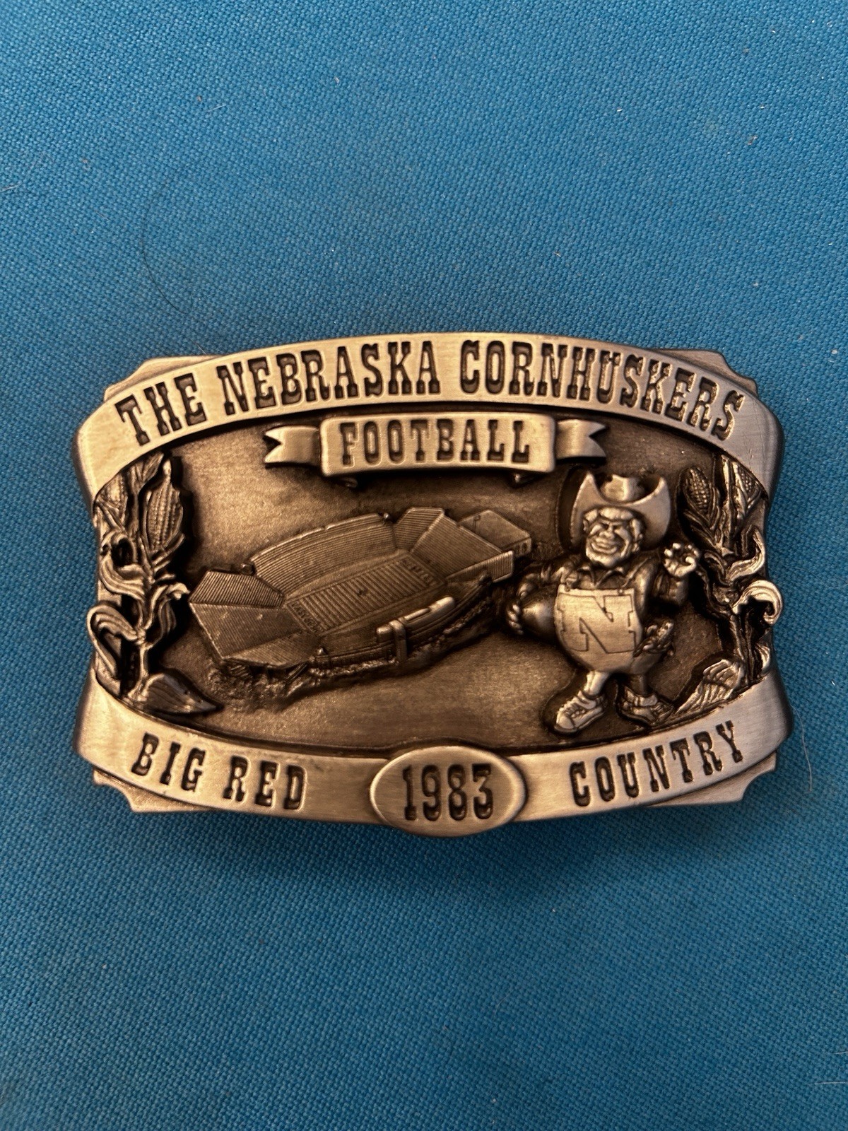 Silver Metal Embossed Plate Belt Buckle – Nebraska USA Football