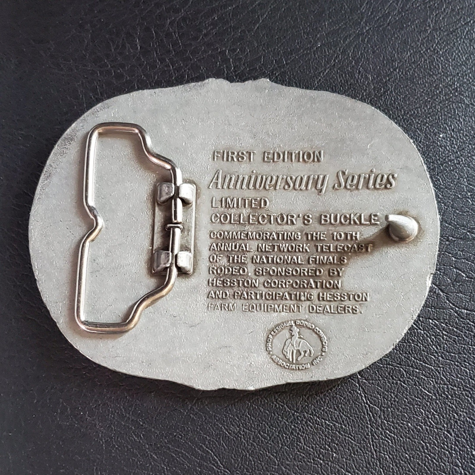 Hesston NFR 25th Anniversary Series 1983 Belt Buckle First Edition Rodeo Pewter