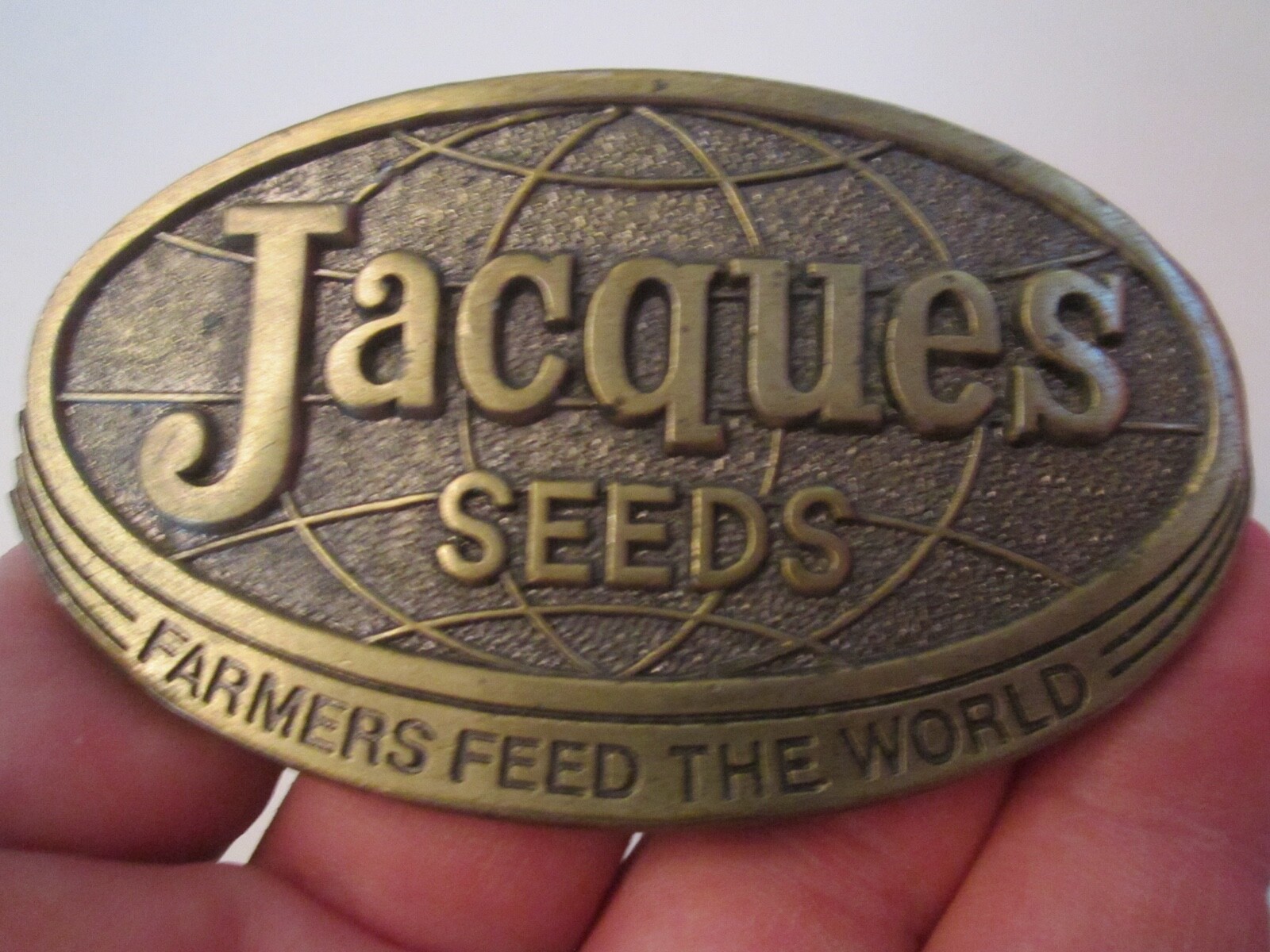 1977 JACQUES SEEDS BELT BUCKLE – FARMERS FEED THE WORLD – LIMITED ED. – GW-16