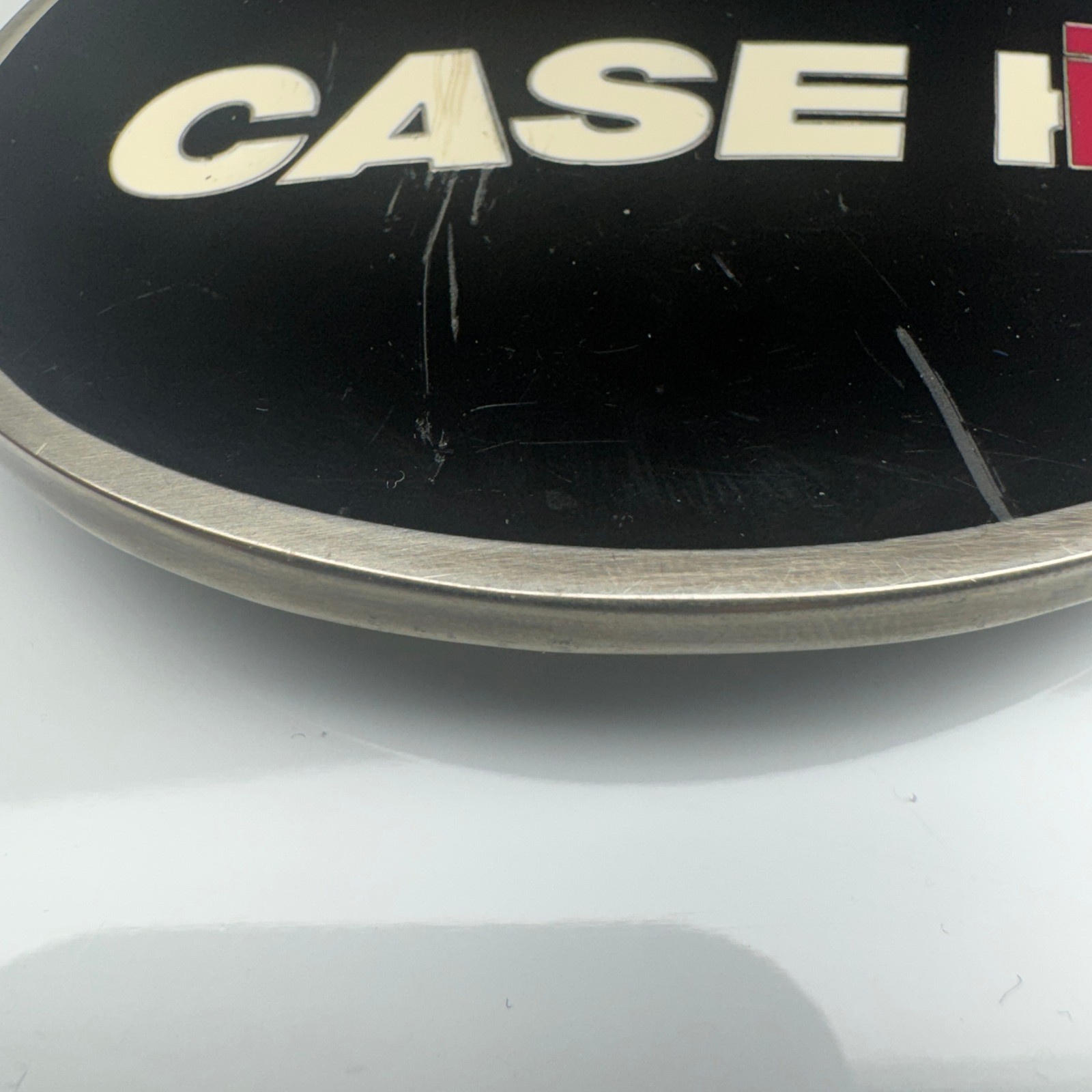 CASE IH Licensed Product Oval Belt Buckle Black Silver Tone CNH America LLC