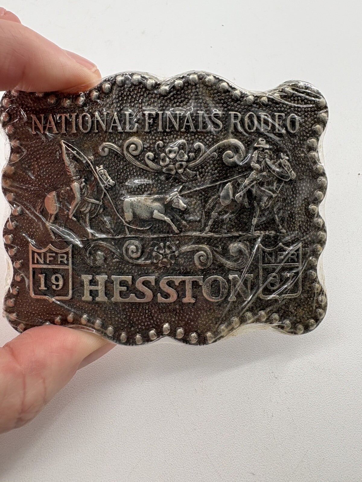 NFR Hesston 1987 Metal Belt Buckle New Sealed Award Design Medals