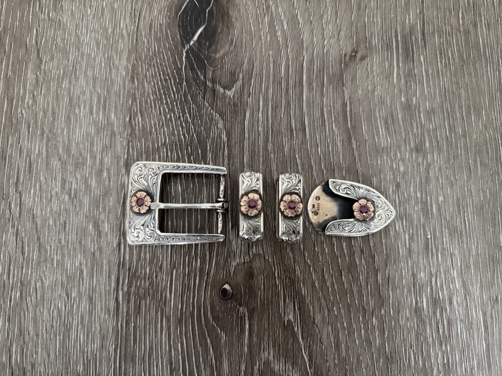 Clint Orms 14k Gold + Ruby belt buckle Set