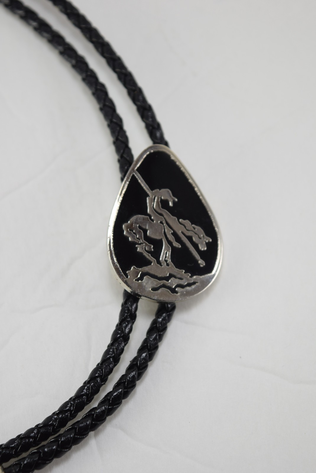 Silver and Black Metal Bolo with End of the Trail Slide Made in USA