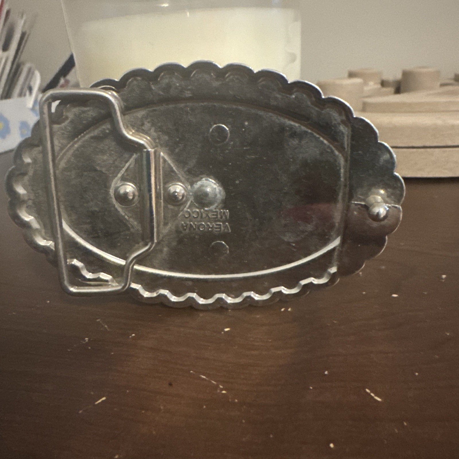 This Is A Silver and Gold-plated Western-style Belt Buckle Featuring an Image In