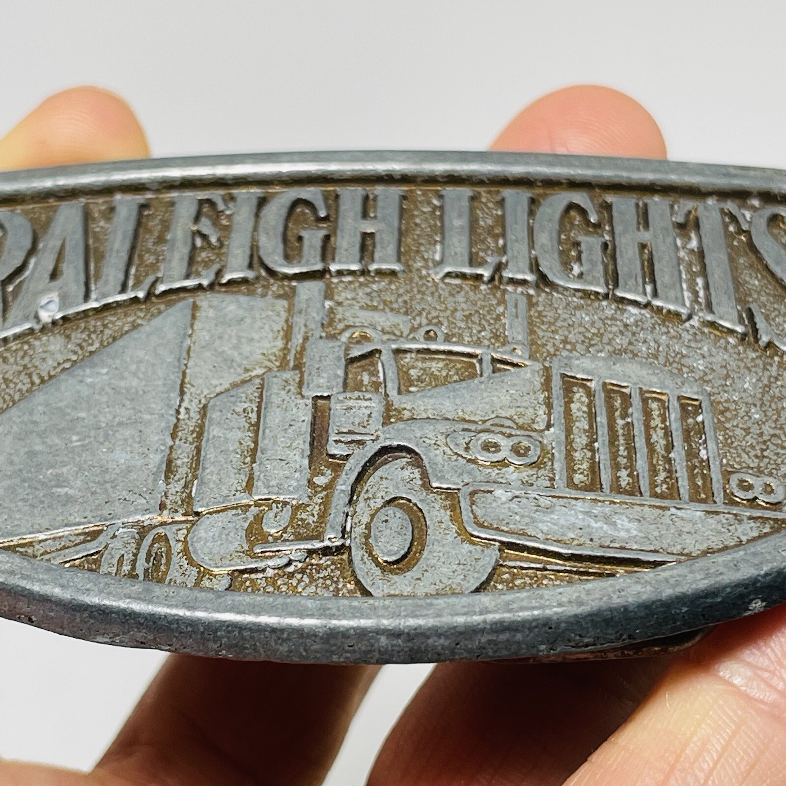 Vintage Raleigh Lights Belt Buckle Men Truck Semi Vehicle Transportation Silver