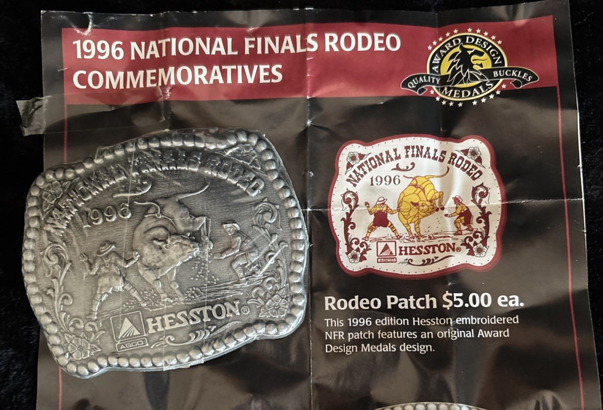 Hesston NFR 1996 Commemorative Belt Buckle New in Shrinkwrap Award Design Medals