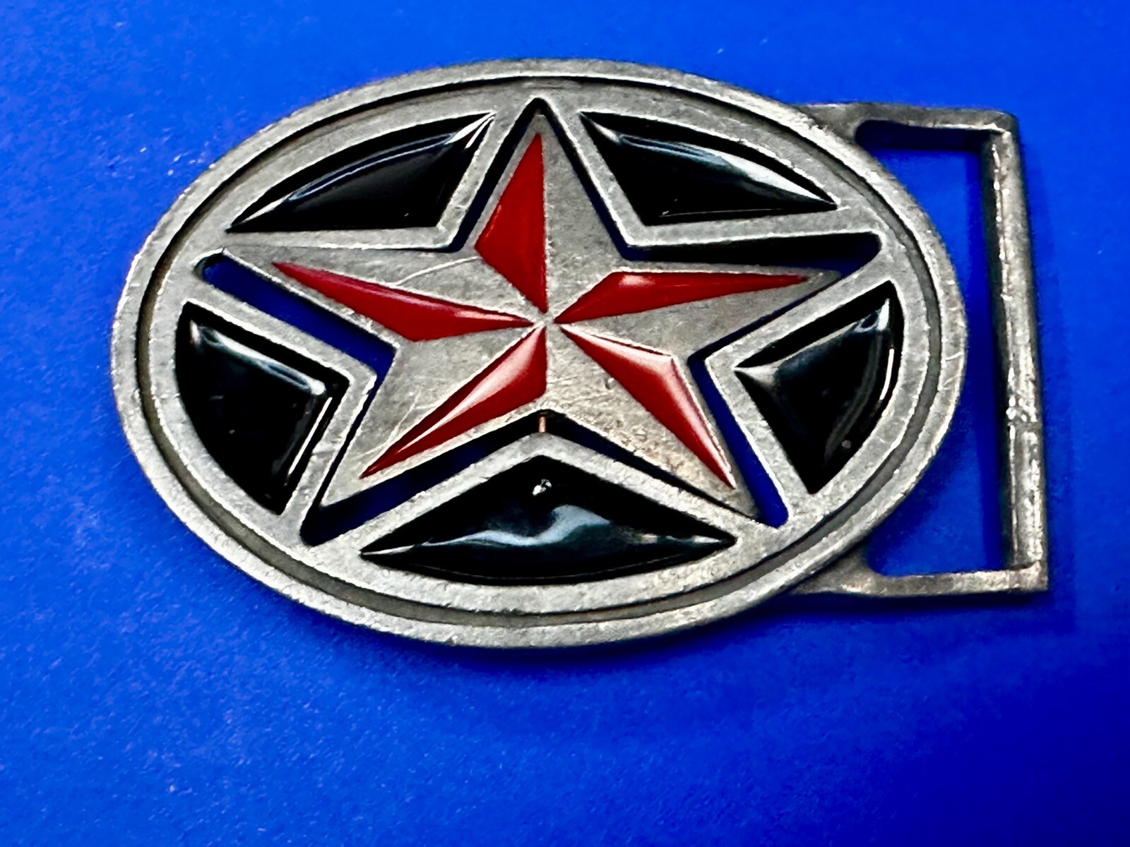Moving Reversible Star (Red or Black) Belt Buckle by Heavy Metal Manufacturing