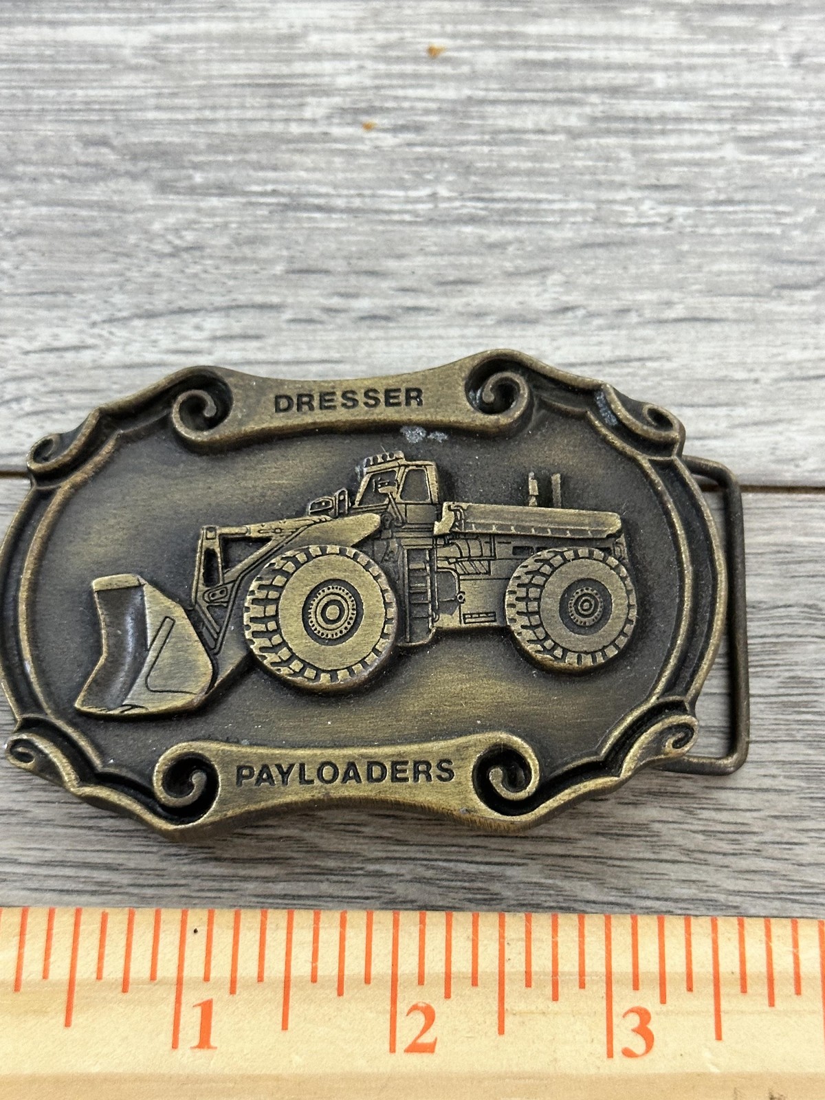 Vintage Spec Cast Dresser Payloaders Belt Buckle Men Brass Tone 1980s broken peg