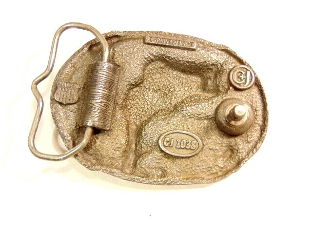 heavy older enameled buckle showing a leaping fish; CJ Inc., 1986, Made in USA