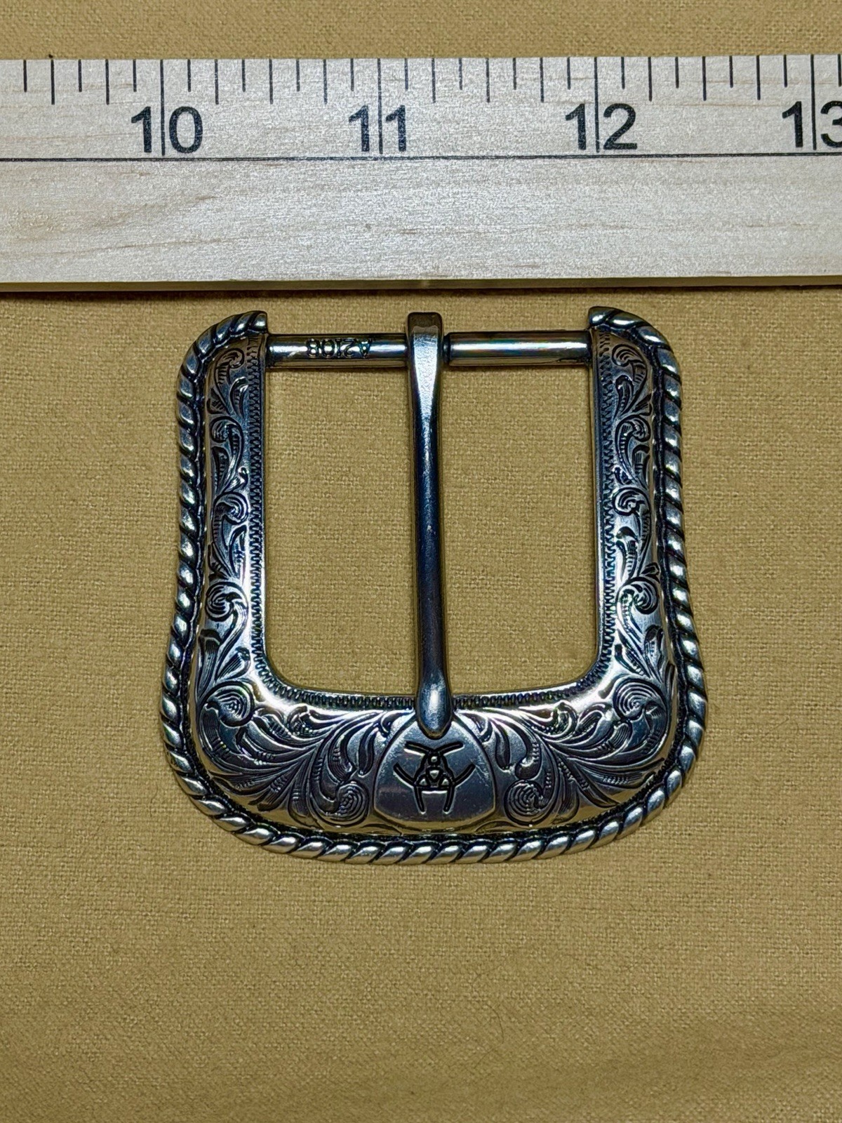 Ariat Western Belt Buckle Filigree Scroll Logo Silver Toned Rope Edge