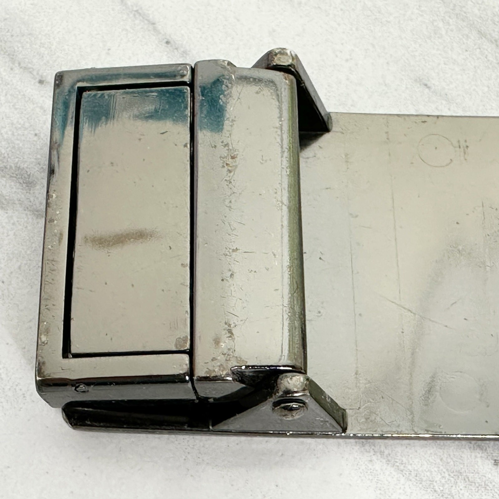 Textured Gunmetal Tone Reversible Clamp On Belt Buckle