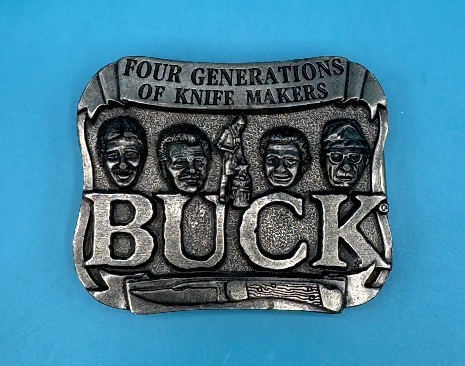 VINTAGE **FOUR GENERATIONS OF KNIFE MAKERS – BUCK KNIVES** BELT BUCKLE