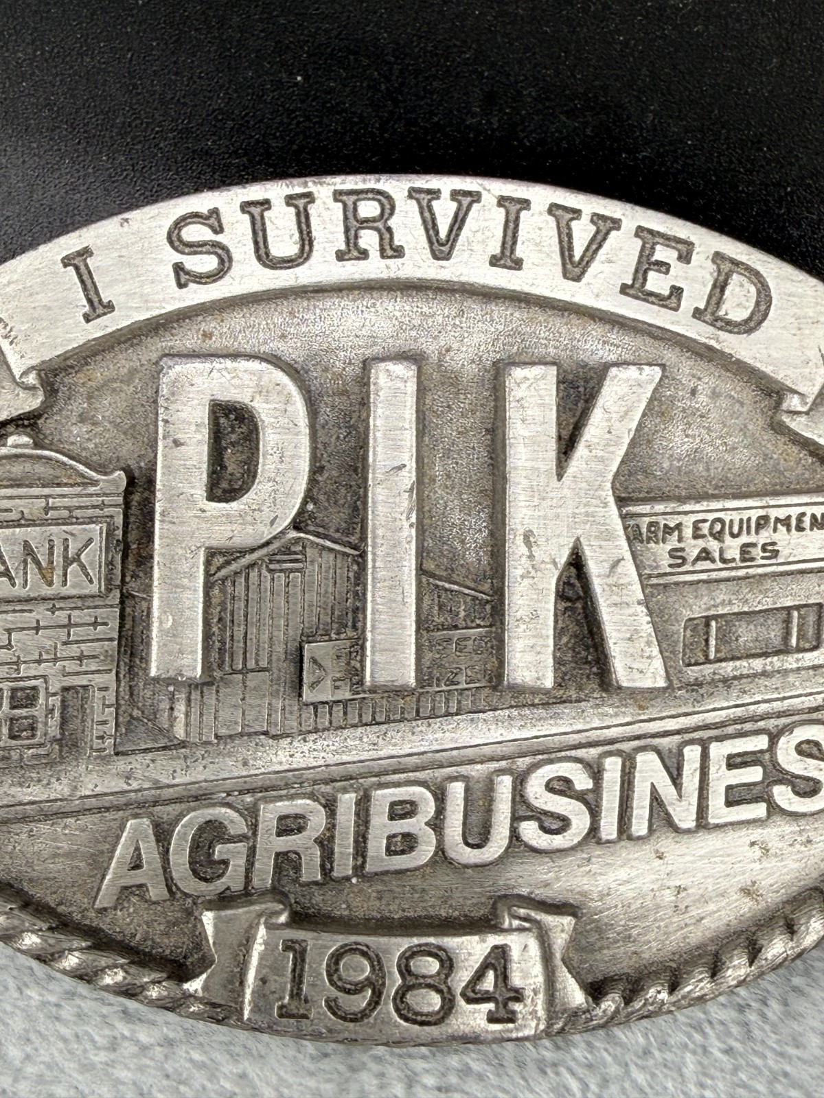 Vintage Ag Belt Buckle PIK 1984 Silver Tone