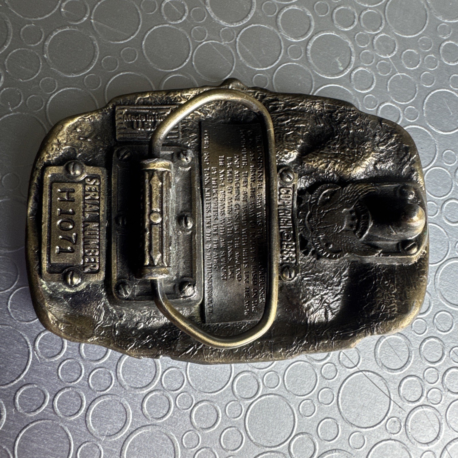 Vintage 1983 US Army Firepower Brass Belt Buckle Great American Co Serial H1071