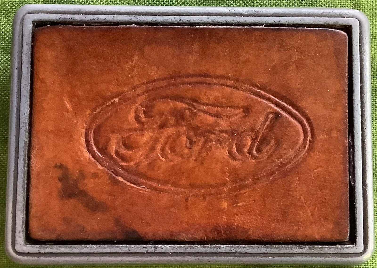 Belt Buckle w/ Ford Logo Embossed on Leather, attached to Metal Backing, NICE.