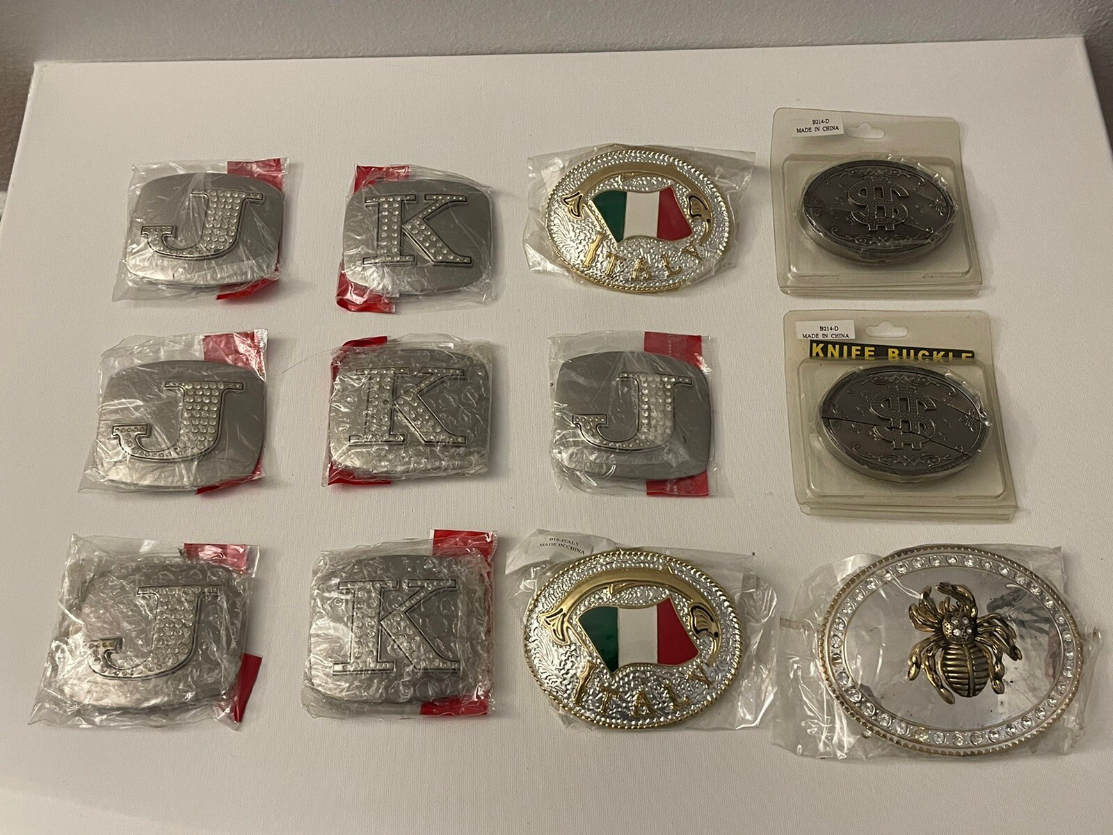 BRAND NEW 12 Belt Buckles (7 Letters, 2 Italy, 2 $ Knife Buckle, 1 Spider)