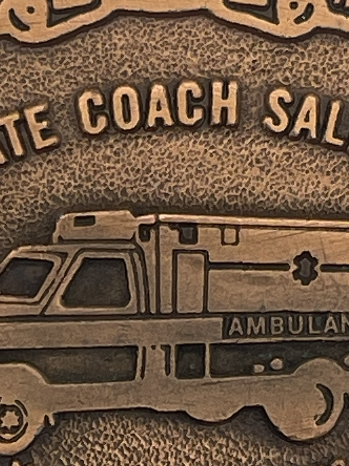AMBULANCE BELT BUCKLE / TRI-STATE COACH SALES, INC. Mc HENRY, ILLINOIS