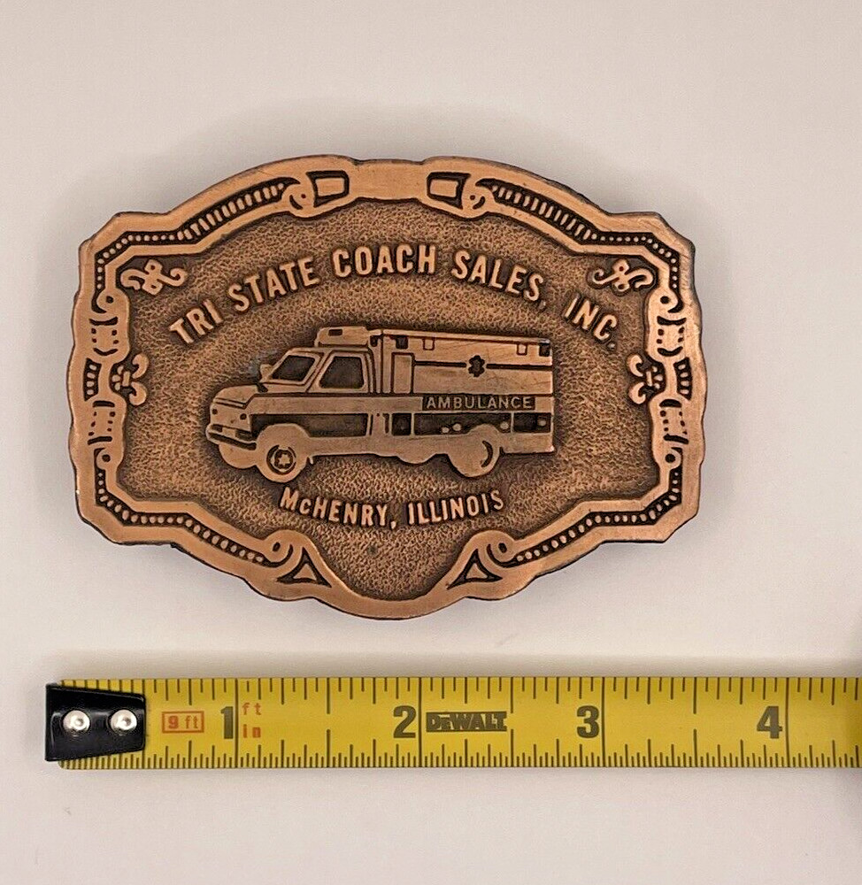 AMBULANCE BELT BUCKLE / TRI-STATE COACH SALES, INC. Mc HENRY, ILLINOIS