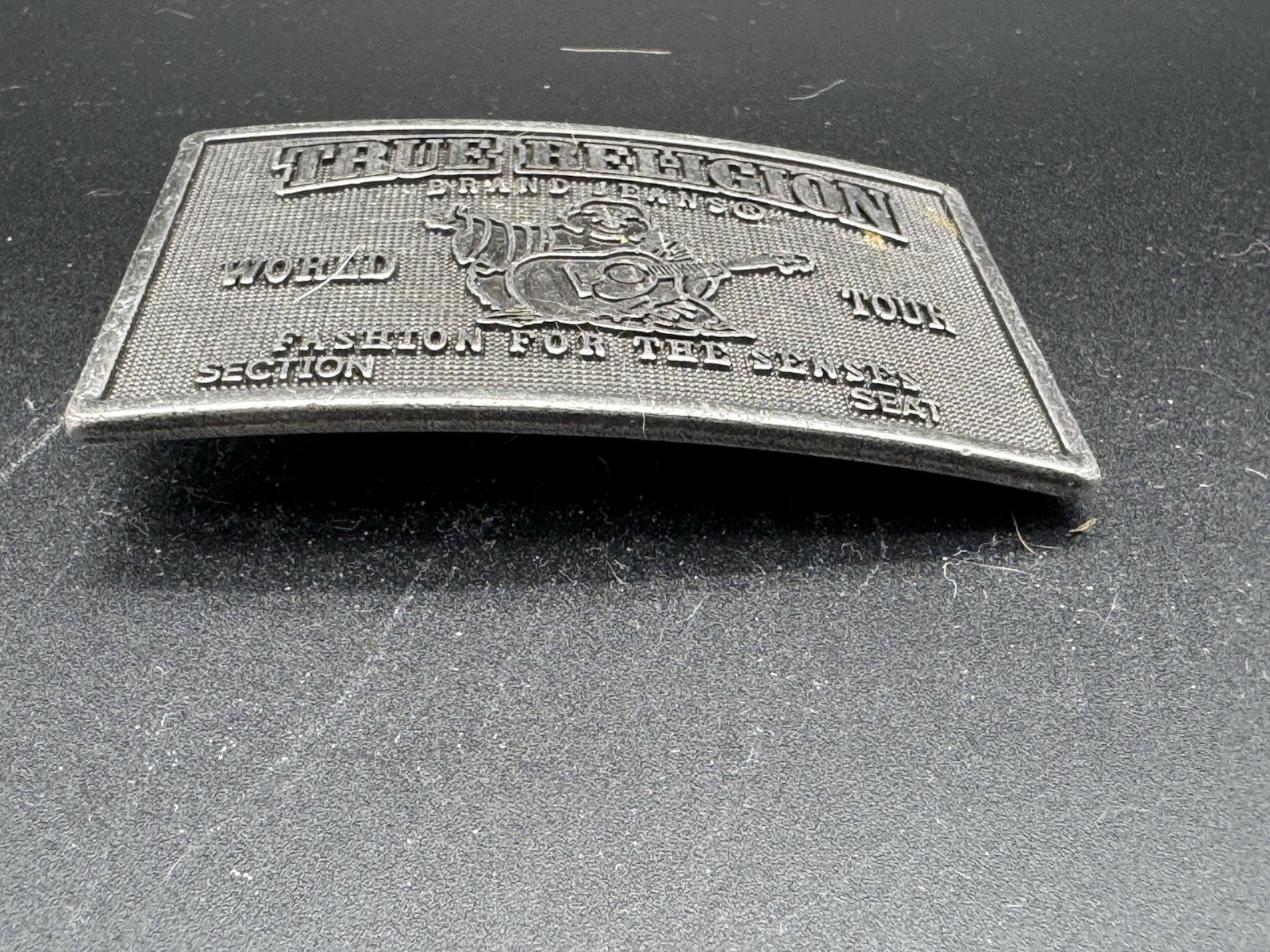 True Religion « World Tour » metal plaque belt buckle