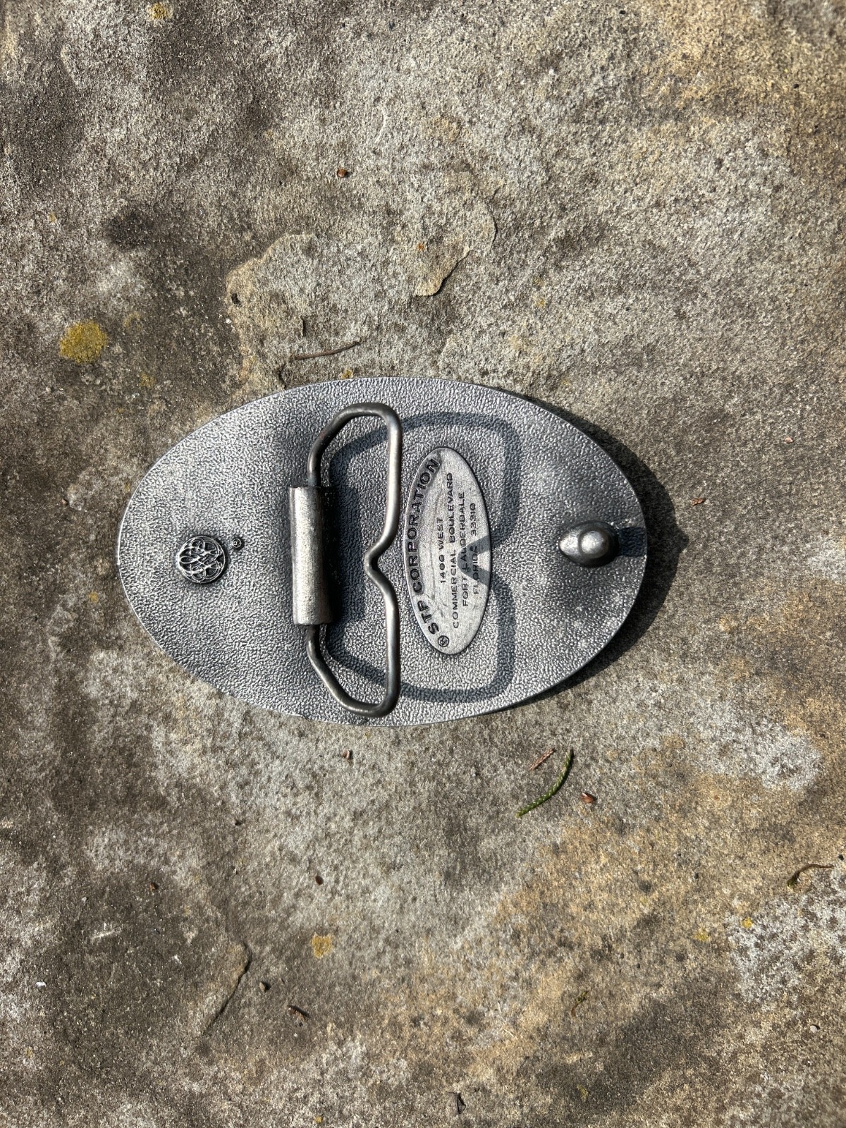 Vintage STP Corporation Belt Buckle from Level Cross NC