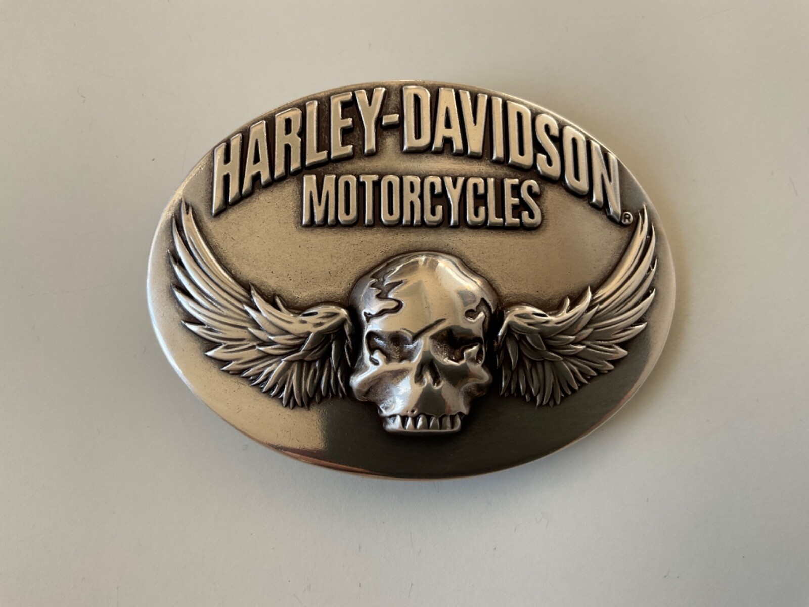 Harley-Davidson men&rsquo;s Skull with Wings belt buckle.#97744-08VM.Silver plated.
