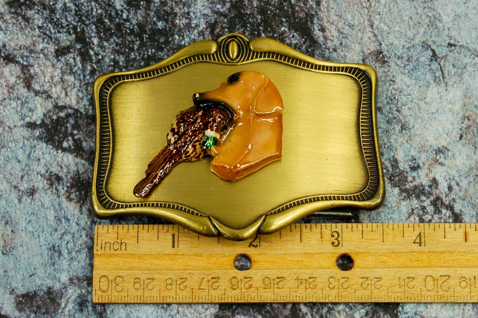 Retriever holding Pheasant 3D relief belt buckle vintage western AHM 1978