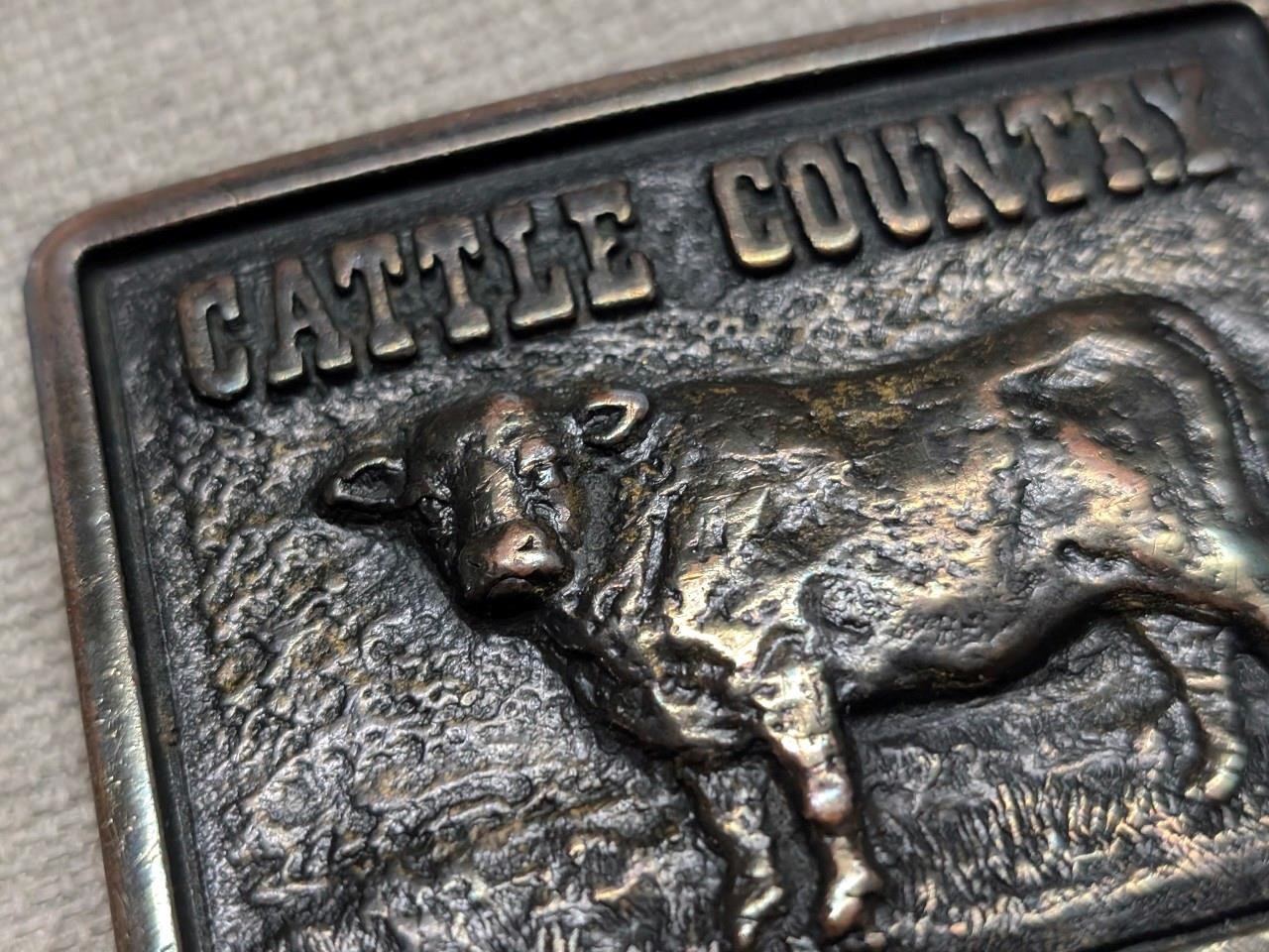 vintage CATTLE COUNTRY belt buckle BRASS cargill COW nutrena WESTERN cowboy
