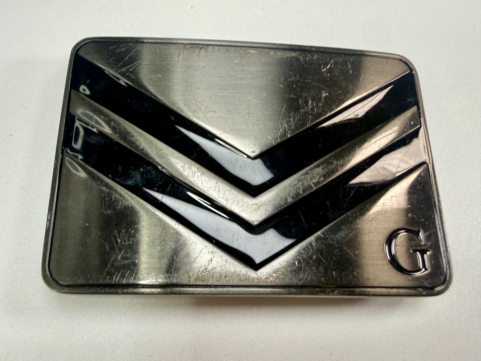 Two Stacked Chevron Shapes? Black Enamel Stripes G Letter Belt Buckle